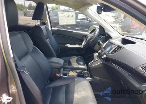 2015 Honda Cr-V Touring z USA, uszkodzony, nr VIN 5J6RM4H91FL058769